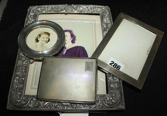 Three silver photo frames & silver cigarette case